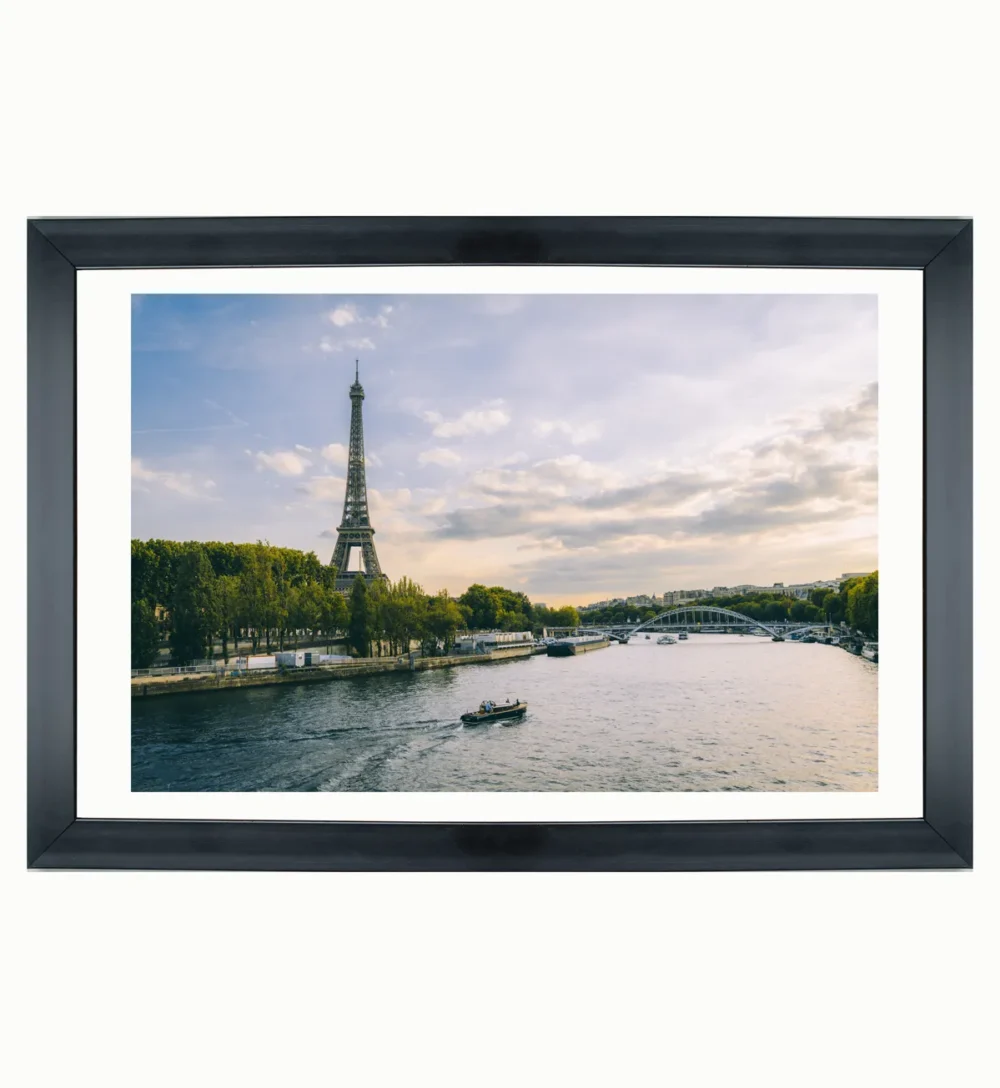 "Twilight Reflections: Boat and Eiffel Tower in Dusk’s Glow"